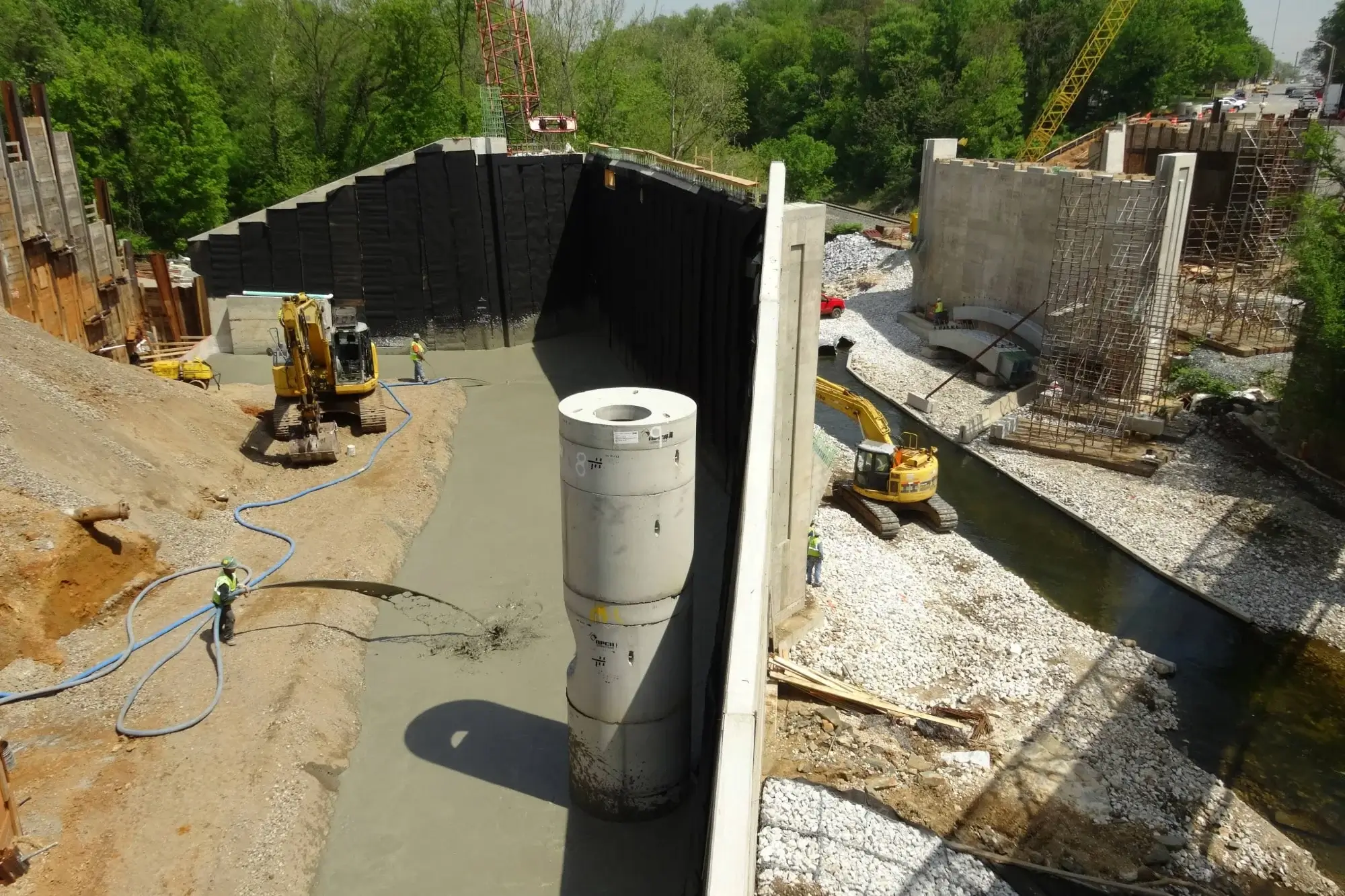 Elastizell Systems using lightweight cellular concrete to fill and stabilize a bridge abutment in Baltimore, Maryland